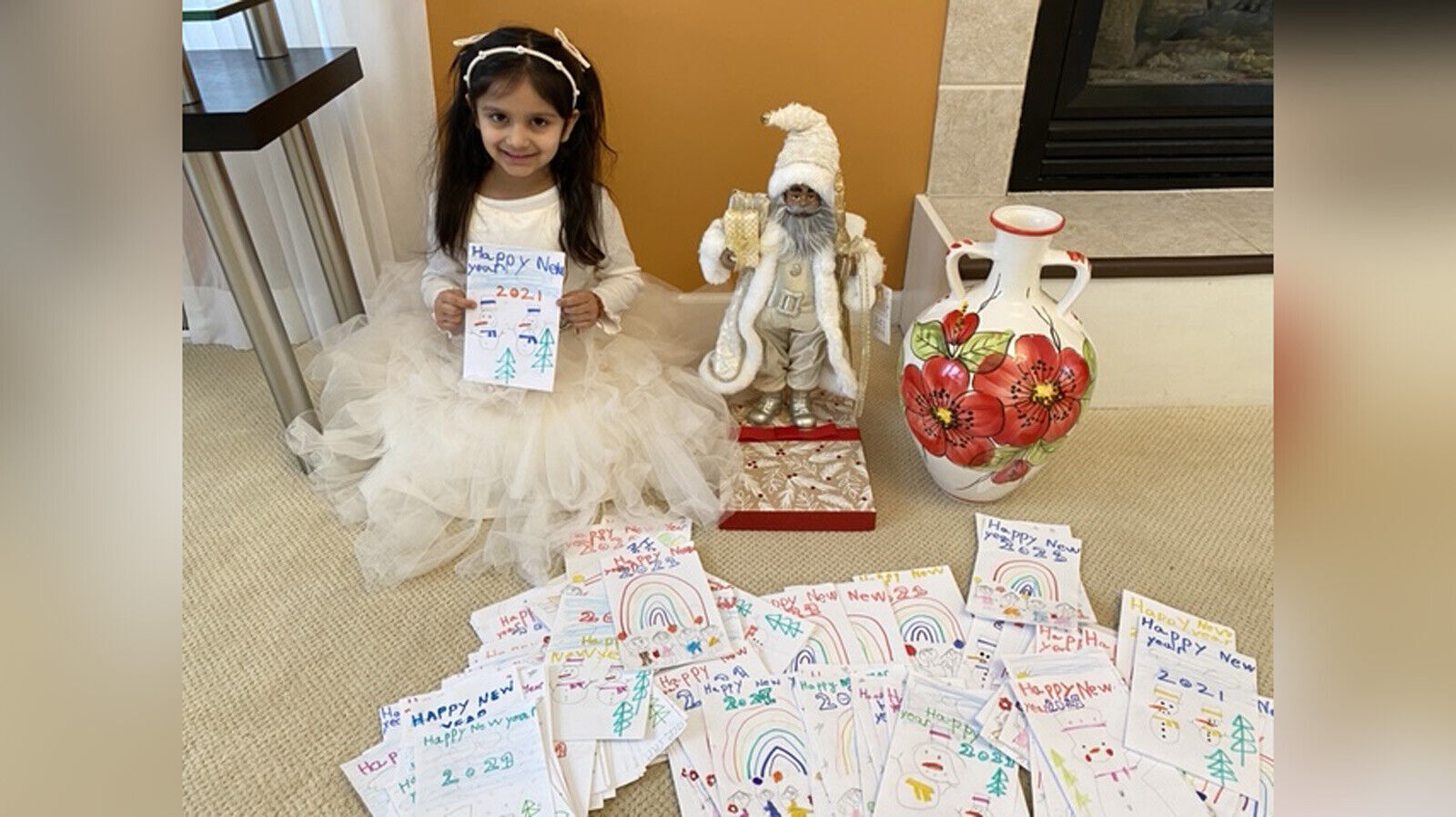 This kindergartner spent almost 2 weeks making 200 New Year's cards for seniors. Then she broke her piggy bank to buy them a gift